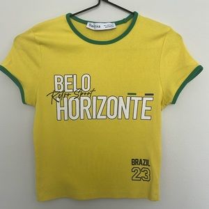 Brazil shirt from Bershka, colors yellow and green in size small.
